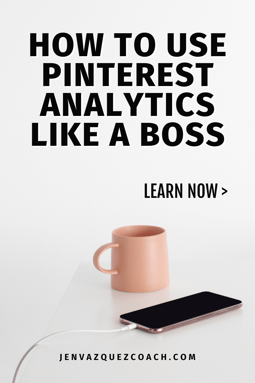 white desk with light orange coffee cup with writing saying how to Use Pinterest Analytics Like a boss